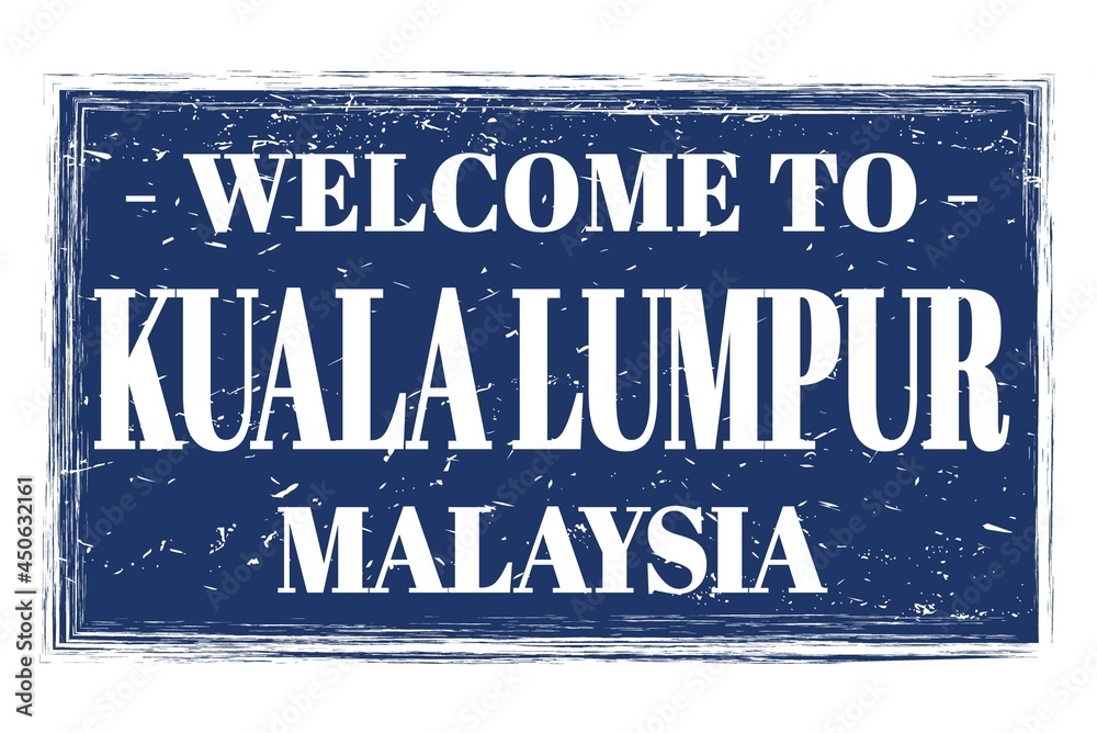 WELCOME TO KUALA LUMPUR - MALAYSIA, words written on blue stamp WELCOME TO KUALA LUMPUR - MALAYSIA, words written on blue stamp