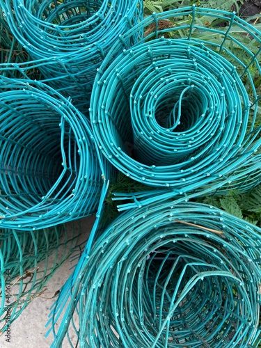 Mesh roll in a cage for garden and vegetable garden