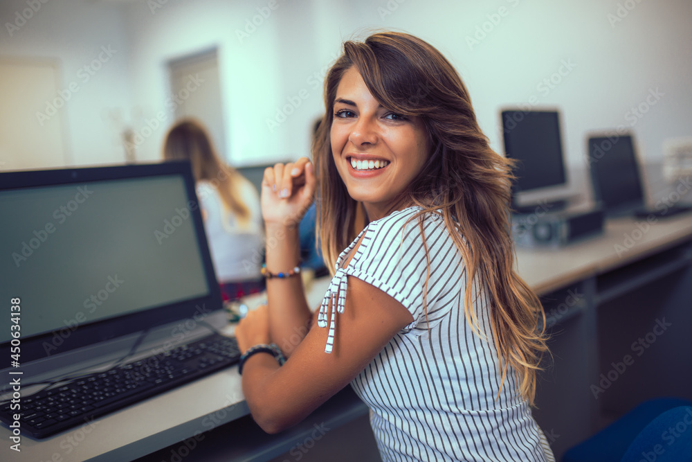 College students in a computer lab College students in a computer lab