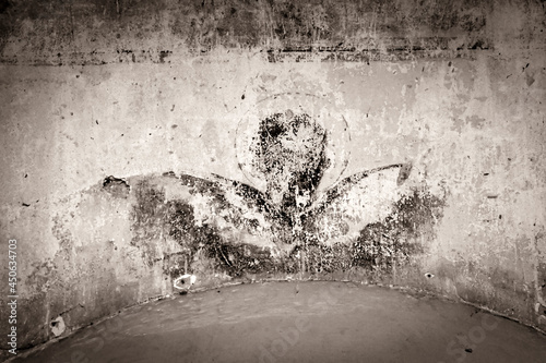 drawings on the walls of an abandoned Orthodox church