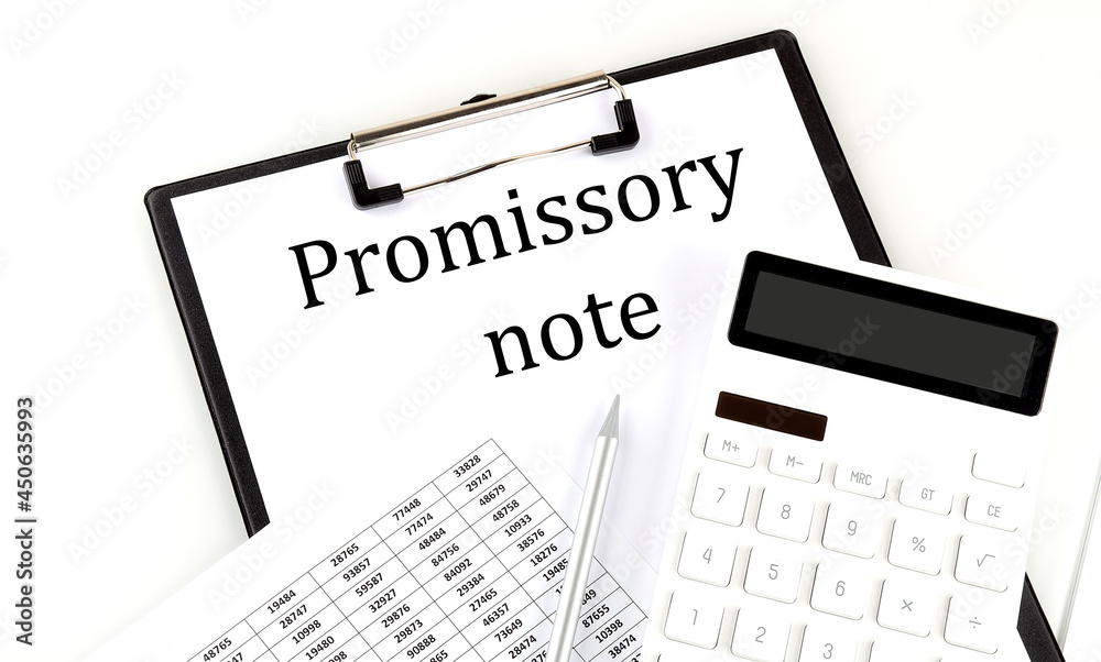 PROMISSORY NOTE text on folder with chart and calculator PROMISSORY NOTE text on folder with chart and calculator