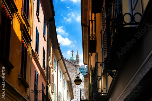 View of Como dome from a narrow street. Example of Italian architecture. 
