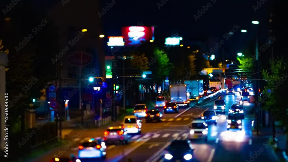A night timelapse of miniature traffic jam at the downtown street tiltshift A night timelapse of miniature traffic jam at the downtown street tiltshift