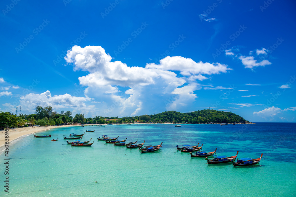 Beautiful Andaman sea, Tropical Turquoise clear blue sea and white sand beach on pattaya beach with blue sky background at Lipe Island, Satun, Thailand -  summer vacation travel