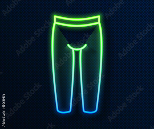 Glowing neon line Leggings icon isolated on blue background. Vector