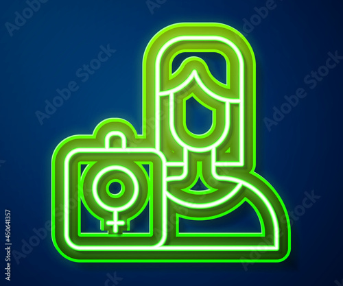 Glowing neon line Female movement, feminist activist with banner and placards icon isolated on blue background. Feminist rights movement, feminism sisterhood. Vector