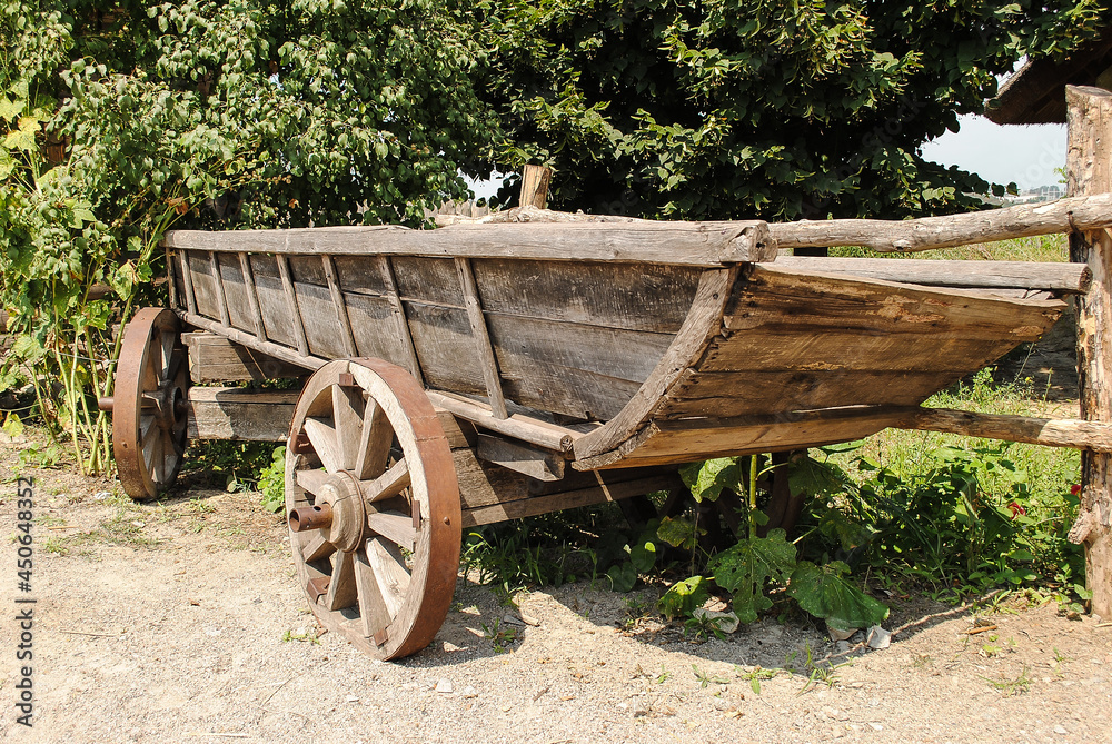 Old wooden cart wooden wheel.