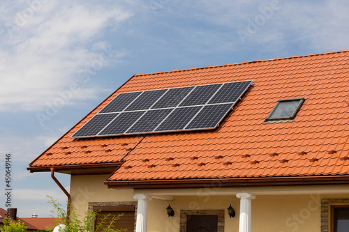 solar panels on a roof of house, modern power solution, environment friendly sun