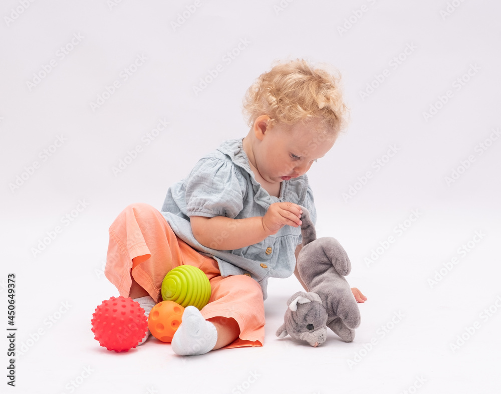 Adorsble baby girl plays with toys Adorsble baby girl plays with toys