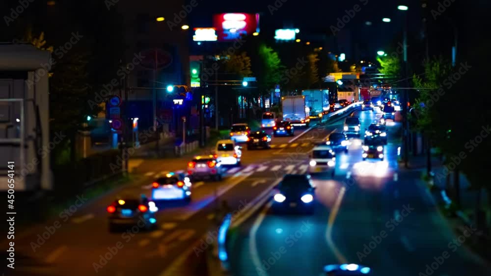 A night timelapse of miniature traffic jam at the downtown street tiltshift tilting A night timelapse of miniature traffic jam at the downtown street tiltshift tilting