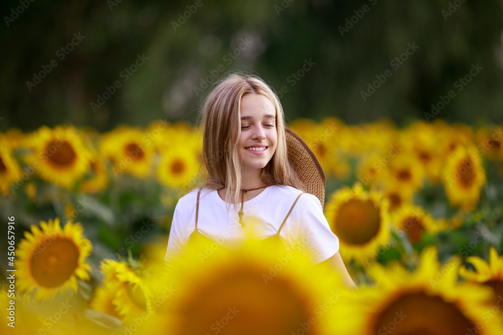 12 year old girl on a field of sunflowers