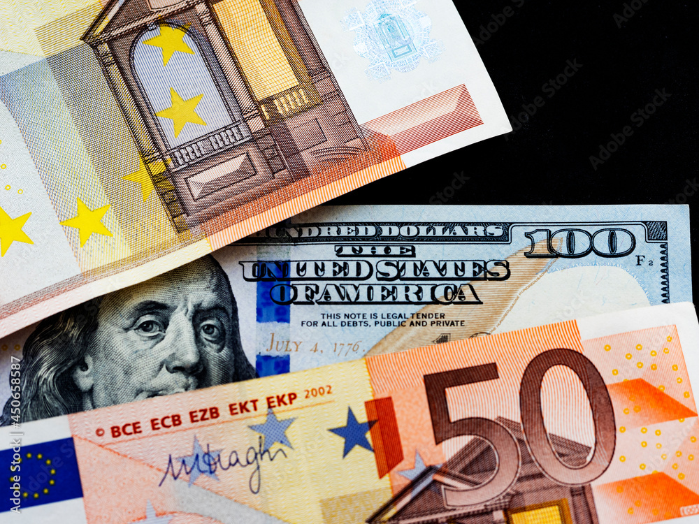 In this photo illustration background of dollar and euro bills In this photo illustration background of dollar and euro bills