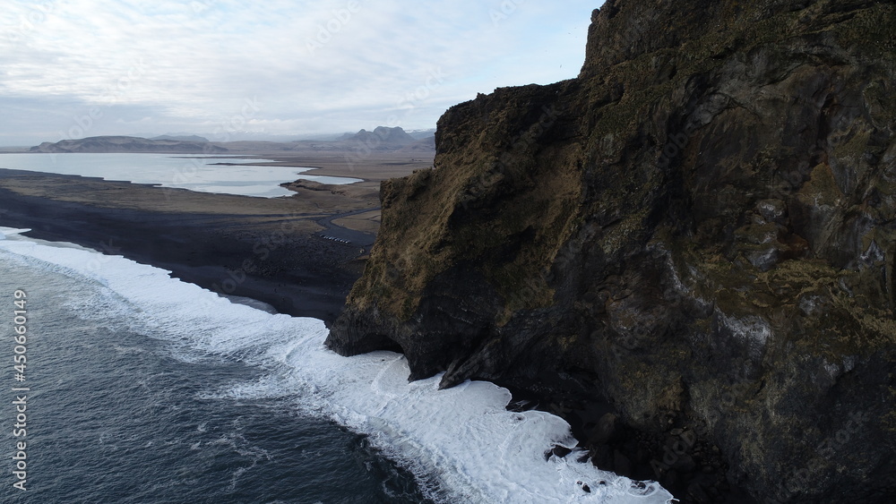 Areal view of cliffs by Reynisfjara black beach in Iceland Areal view of cliffs by Reynisfjara black beach in Iceland