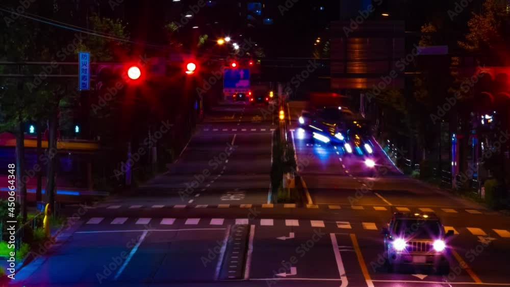 A night timelapse of traffic jam at the downtown street in Tokyo long shot tilt A night timelapse of traffic jam at the downtown street in Tokyo long shot tilt