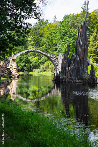 Rakotzbrucke bridge in Germany reflecting in the water