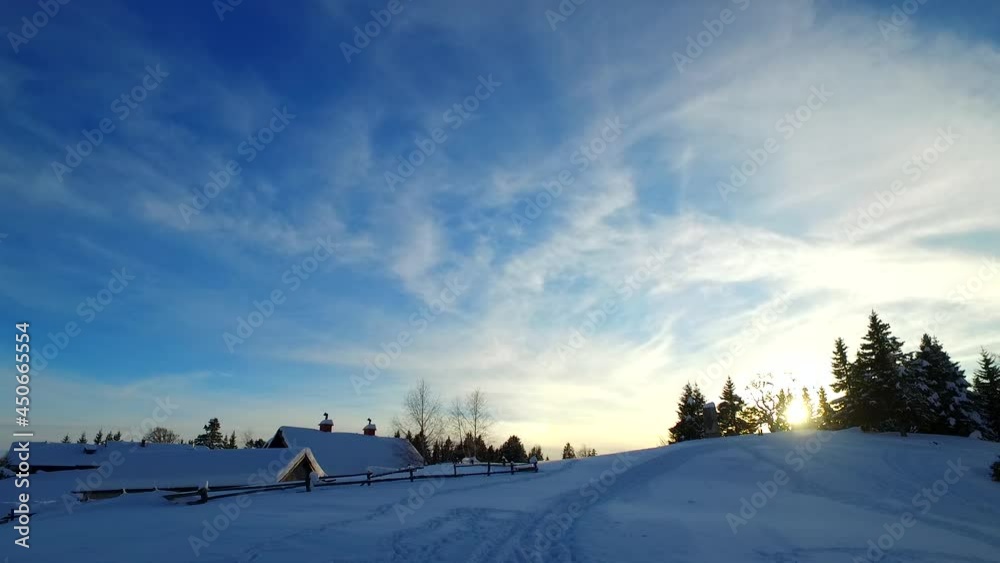 Small village in a cold winter evening, just before sun goes down and cold evening splashes over it. In the cold mountains. Europe. Small village in a cold winter evening, just before sun goes down and cold evening splashes over it. In the cold mountains. Europe.