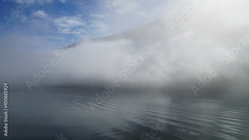 Принти на полотні fog over the sea and mountains, Isafjordur, Iceland