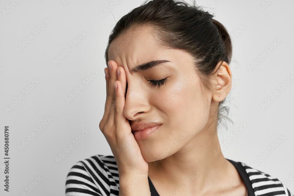 woman holding her head migraine pain depression dissatisfaction woman holding her head migraine pain depression dissatisfaction