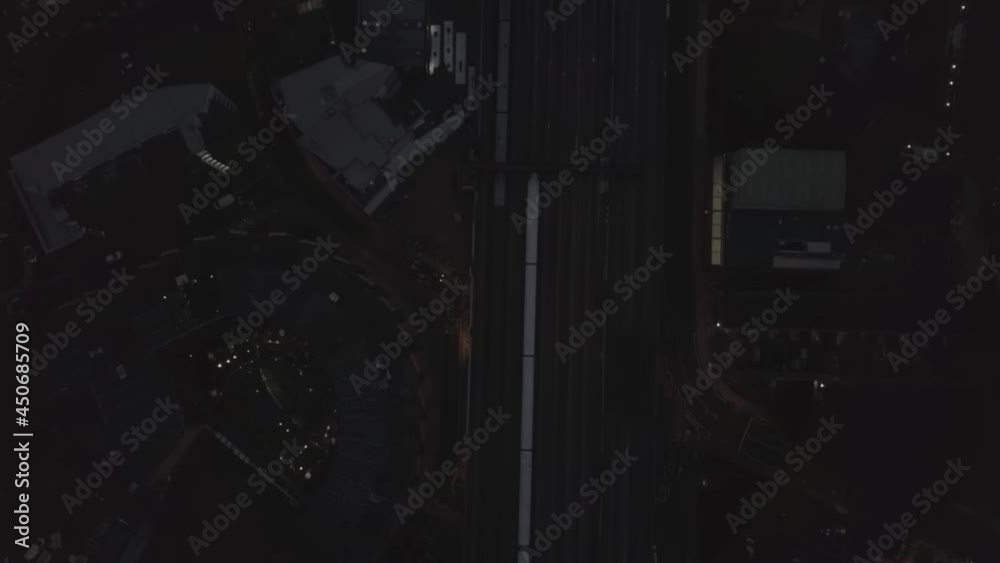 Sideways aerial birds eye overhead top down view of train passing by on London Bridge train station railway in London city, UK, evening Sideways aerial birds eye overhead top down view of train passing by on London Bridge train station railway in London city, UK, evening