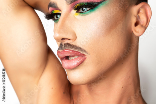 Fotografie closeup of man with mustache and glamorous makeup