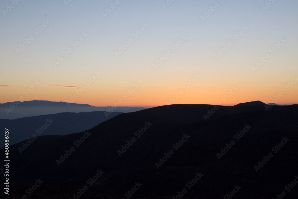 Fototapeta premium sunset over the mountains