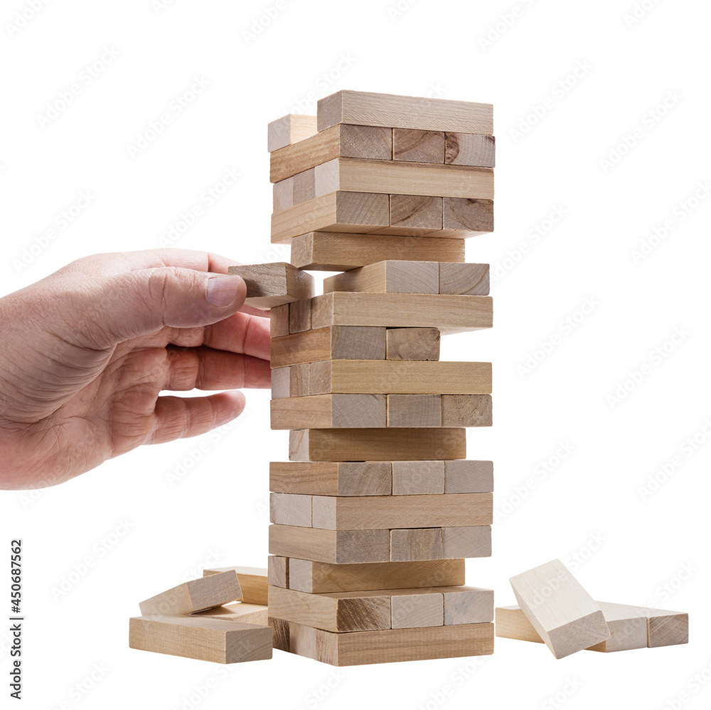 hand game is a tower made of wooden blocks isolated