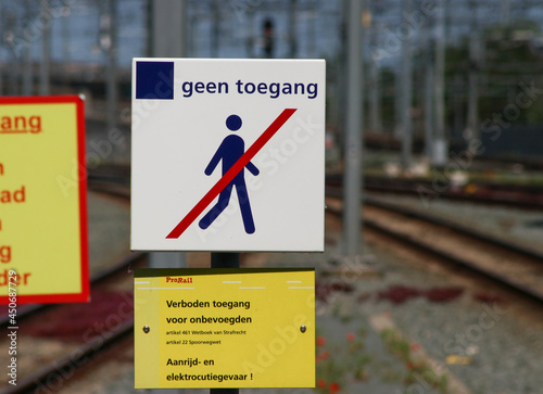 Sign on the end of platform to prevent people go walking on tracks