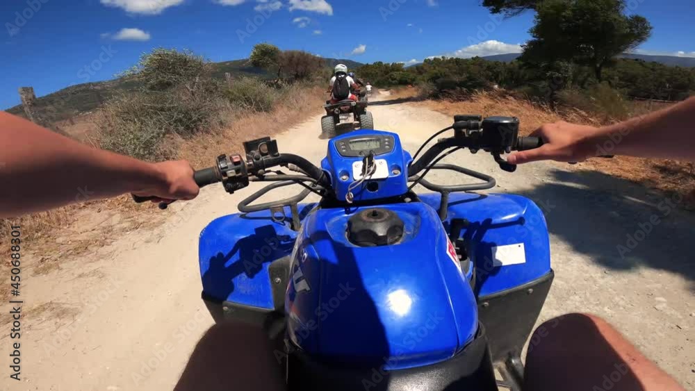 Driving an ATV on offroad in Spain. Firstperson view on an action