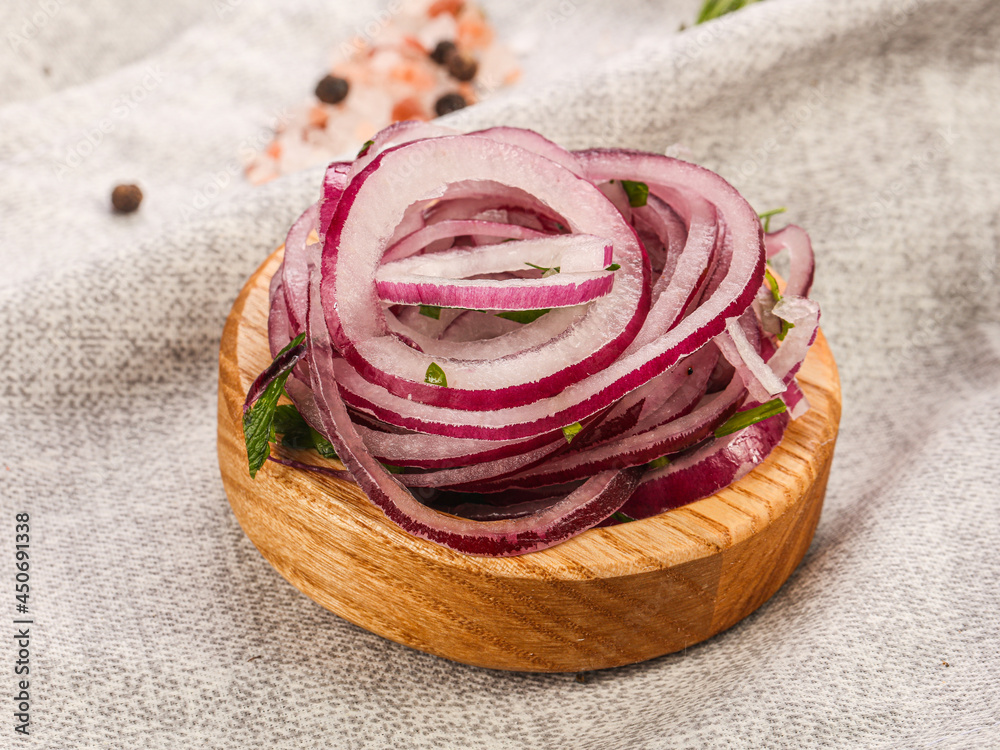 Sliced red onion rings in the bowl