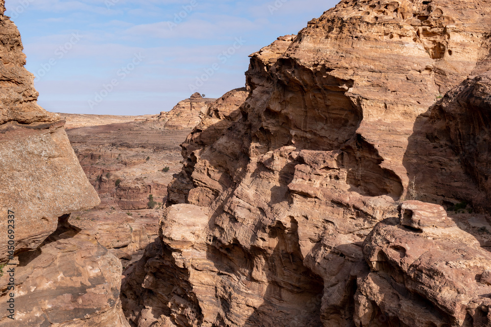 View of mountain canyon in Wadi Rum, Jordan. Red mountains against the blue sky