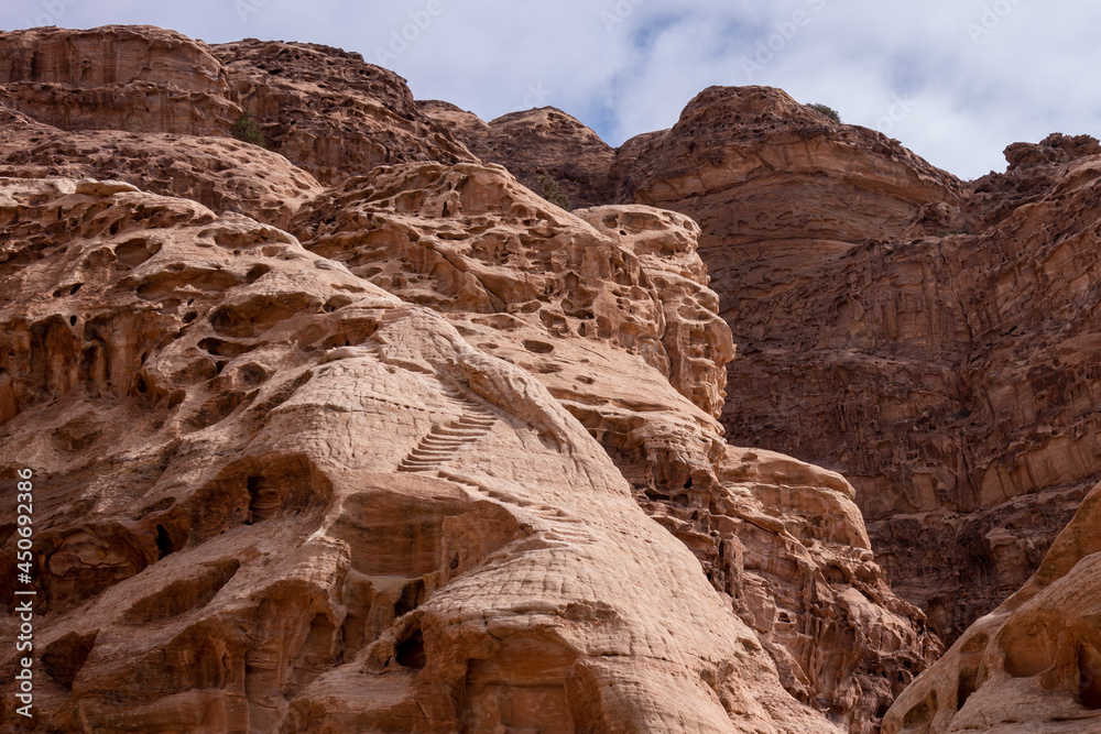 View of mountain canyon in Wadi Rum, Jordan. Red mountains against the blue sky