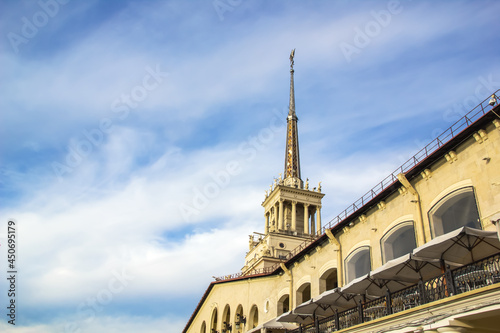 The building is in the style of the Stalin Empire. Picture of the station in Sochi against the sky. Seaport on the Black Sea, Krasnodar Territory
