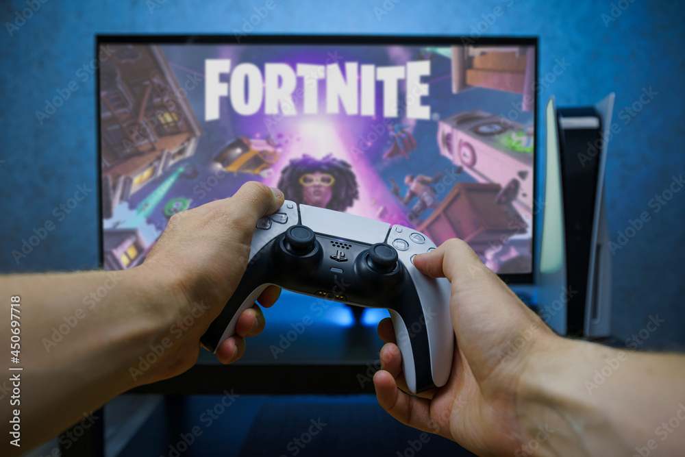Fortnite video game on new generation Sony Playstation 5 video console.  Point of view shot. Stock Photo | Adobe Stock
