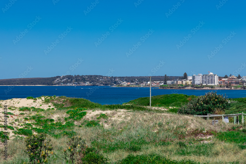Panorama view of Cronulla Beach and the buildings high-rise apartments in Sydney NSW Australia Panorama view of Cronulla Beach and the buildings high-rise apartments in Sydney NSW Australia