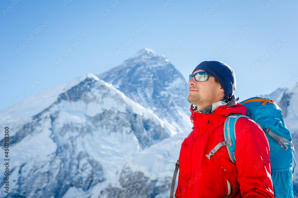 Hiking in Himalaya mountains. Face to face with mount Everest, Earth's highest mountain. Travel sport lifestyle concept
