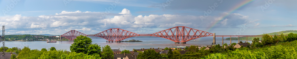 A panorma view with rainbow backlight of the Forth Railway bridge, Scotland on a summers day A panorma view with rainbow backlight of the Forth Railway bridge, Scotland on a summers day