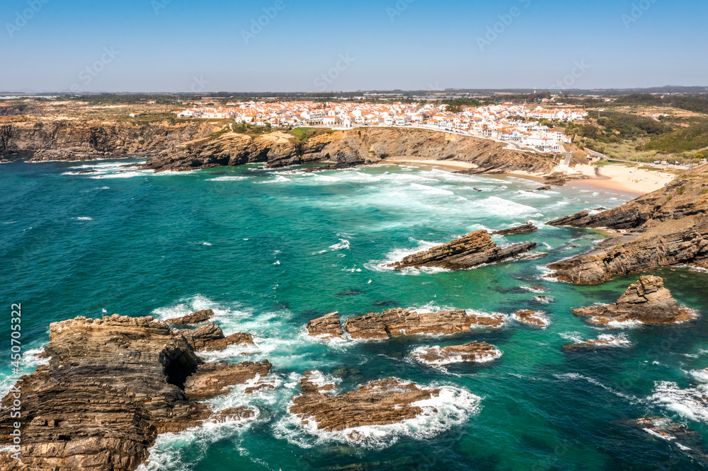 Aerial view of Zambujeira do Mar - charming town on cliffs by the Atlantic Ocean in Portugal