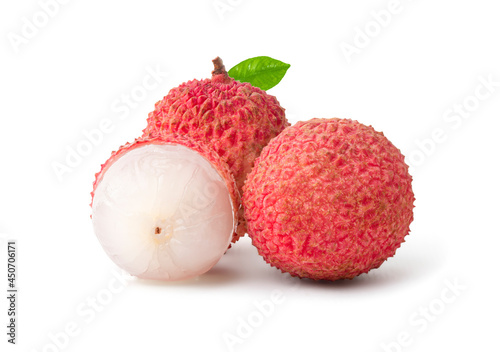 Lychee with leaves isolated on white background. Tropical fruit