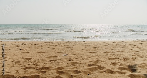 Beauty in nature seascape beach waves surf in sunny day summertime at tropical Hua Hin beach in Thailand  