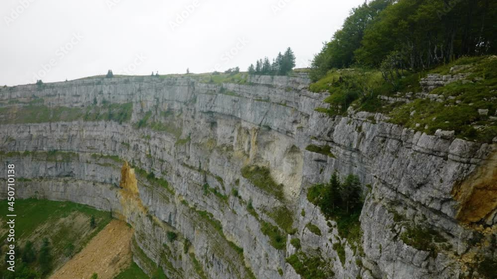 The Creux du Van in the Swiss Jura at sunrise. The Creux du Van in the Swiss Jura at sunrise.