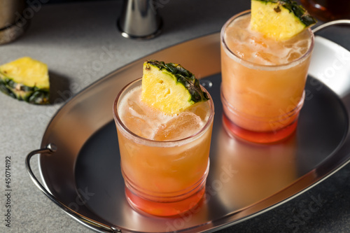 Boozy Refreshing Rum Swizzle Cocktail photo