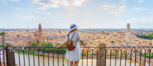 Canvas Print Woman enjoying beautiful view on Verona city in Italy on the sunset