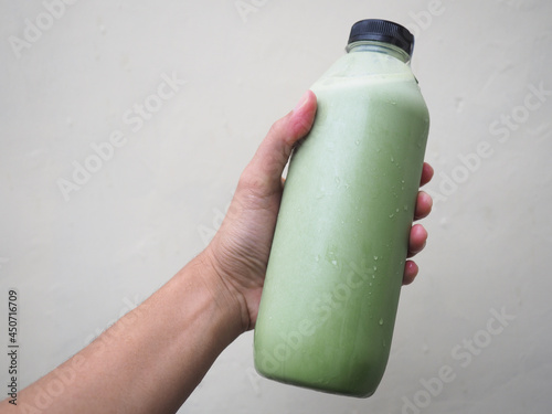 Photography A bottle of green tea drink