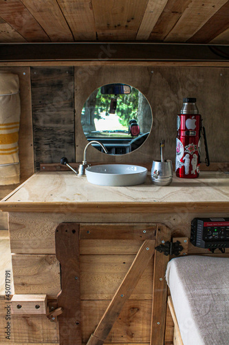 wooden kitchen table in a van