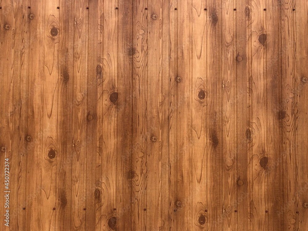 Naklejka premium brown background made of vertical wooden boards