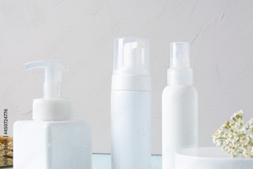 Set of cosmetics products with herbal on a grey background. Natural organic cosmetic. Beauty concept. Set of cosmetics products with herbal on a grey background. Natural organic cosmetic. Beauty concept.