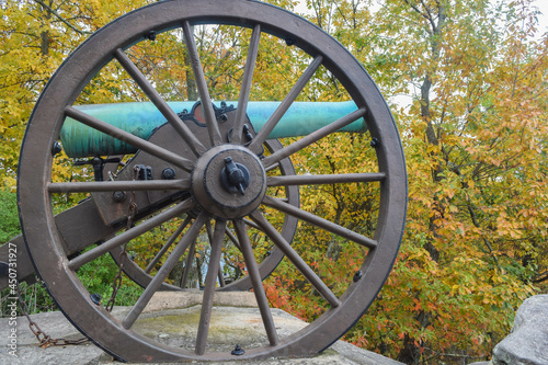 old Cannon and wheel in the park