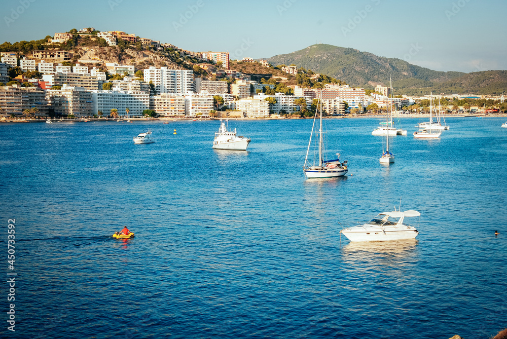 Obraz premium MAJORCA Boats moored in clear Mediterranean waters off the coast