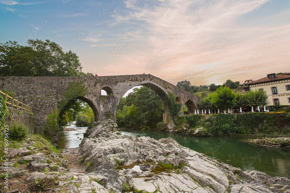 Old Roman stone bridge in Cangas de Onis (Asturias), Spain in a sunny day