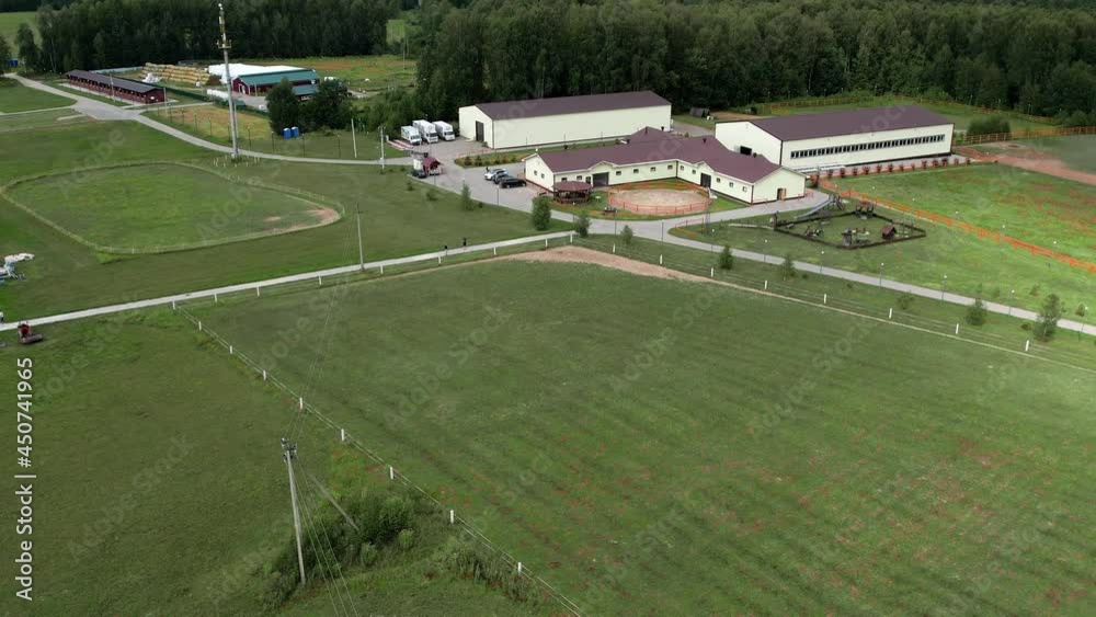 Flying over a farm producing cheese.Cheese farm.Green fields.Nature.Aerial photography.Cheese factory Flying over a farm producing cheese.Cheese farm.Green fields.Nature.Aerial photography.Cheese factory